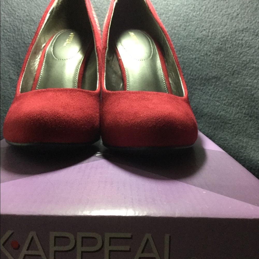 Red pumps with Studs